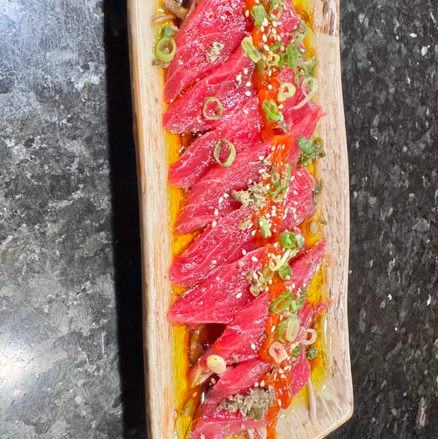 Tuna Tataki, White Fish, or Escolar Carpaccio.